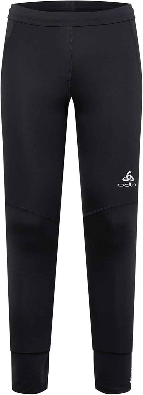 Un uomo che indossa leggings sportivi Odlo uomo regolazione umidità movimento durante una corsa in un parco urbano